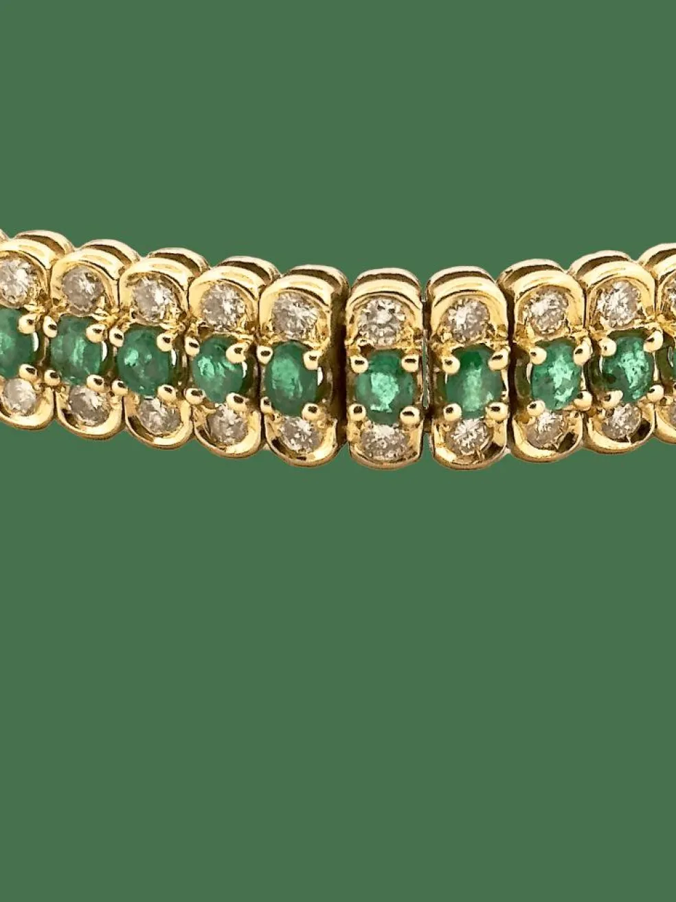 Bracelet or jaune, émeraudes et diamants
