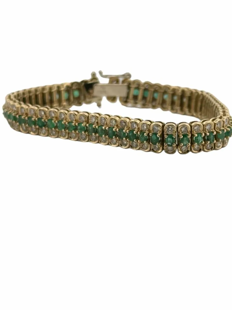 Bracelet or jaune, émeraudes et diamants