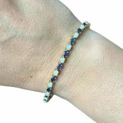 Bracelet or jaune, saphirs et opales