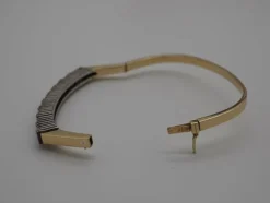 Bracelet or jaune, saphirs rouge et diamants