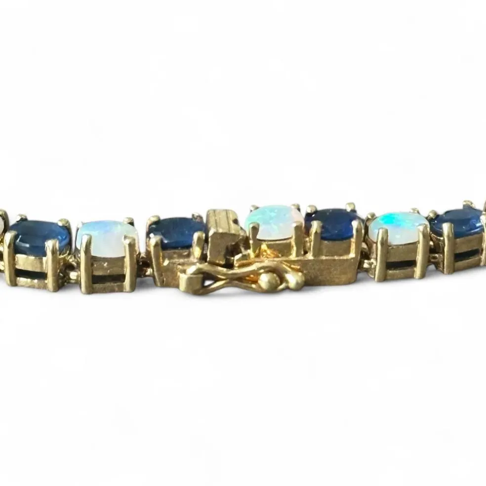 Bracelet or jaune, saphirs et opales