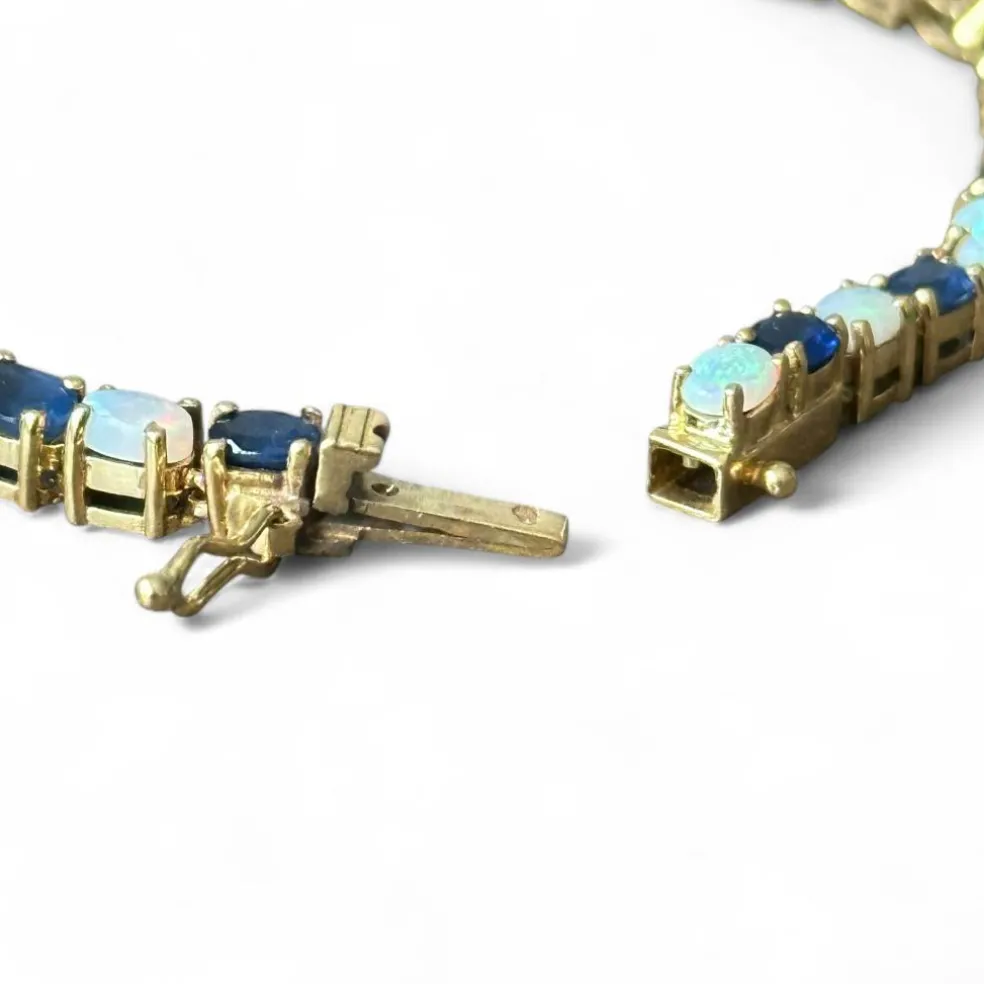 Bracelet or jaune, saphirs et opales