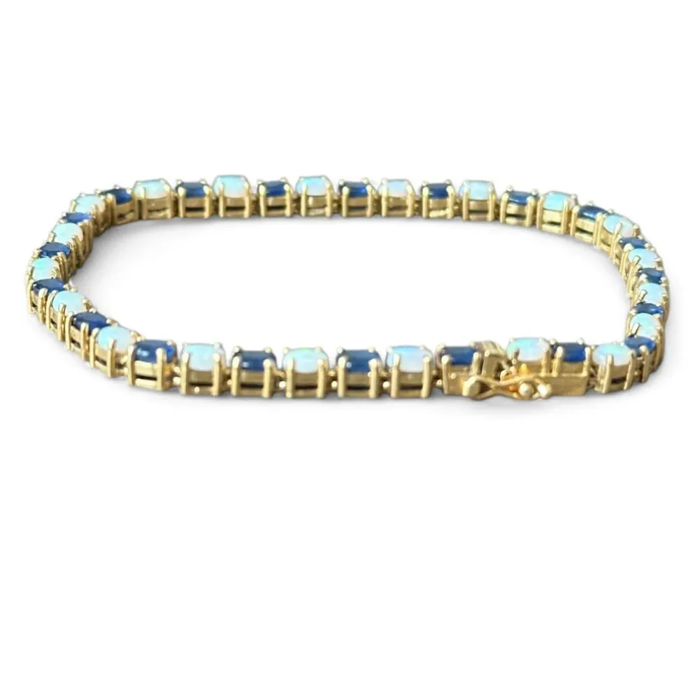 Bracelet or jaune, saphirs et opales