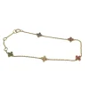 Bracelet or jaune serti de fleurs saphir multi-couleur