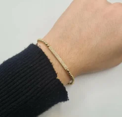 Bracelet or jaune serti d’une barrette de diamants