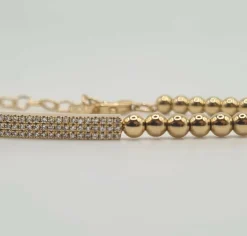 Bracelet or jaune serti d’une barrette de diamants