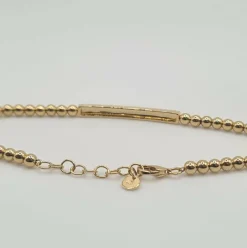 Bracelet or jaune serti d’une barrette de diamants