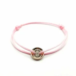 Bracelet or rose, diamants sur cordon signé Ely Bela
