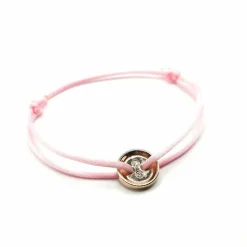 Bracelet or rose, diamants sur cordon signé Ely Bela