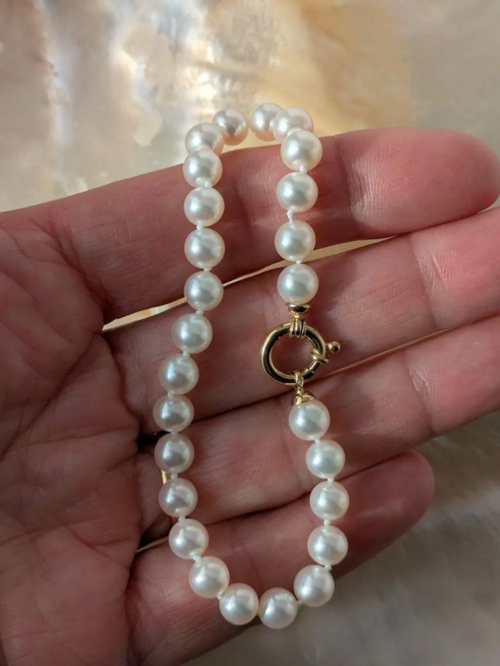 Bracelet perles, fermoir anneau marin