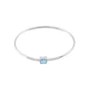 Bracelet rigide en or blanc avec topaze bleue et zircons