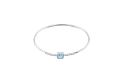 Bracelet rigide en or blanc avec topaze bleue et zircons