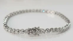 Bracelet rivière en or blanc et diamants sertis clos