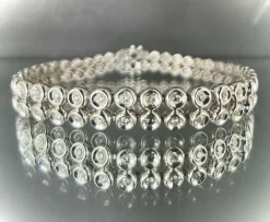 Bracelet rivière or blanc double orné de 80 brillants de 0,03 carat chacun