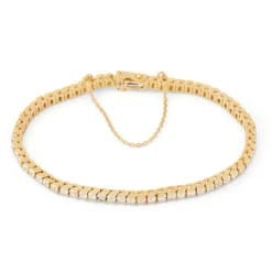 Bracelet rivière or jaune orné de diamant taille brillant