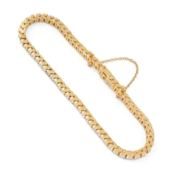 Bracelet rivière or jaune orné de diamant taille brillant