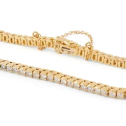 Bracelet rivière or jaune orné de diamant taille brillant