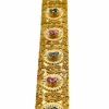 Bracelet rétro Brevetto en or jaune, rubis et saphirs