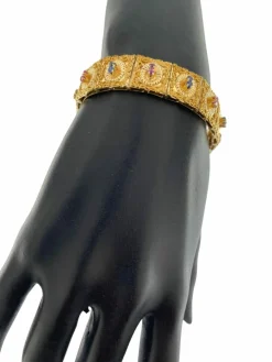 Bracelet rétro Brevetto en or jaune, rubis et saphirs