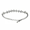 Bracelet semi-rigide en or blanc avec diamants