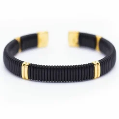 Bracelet semi-rigide en or et émeraudes