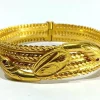 Bracelet serpent or jaune et rubis