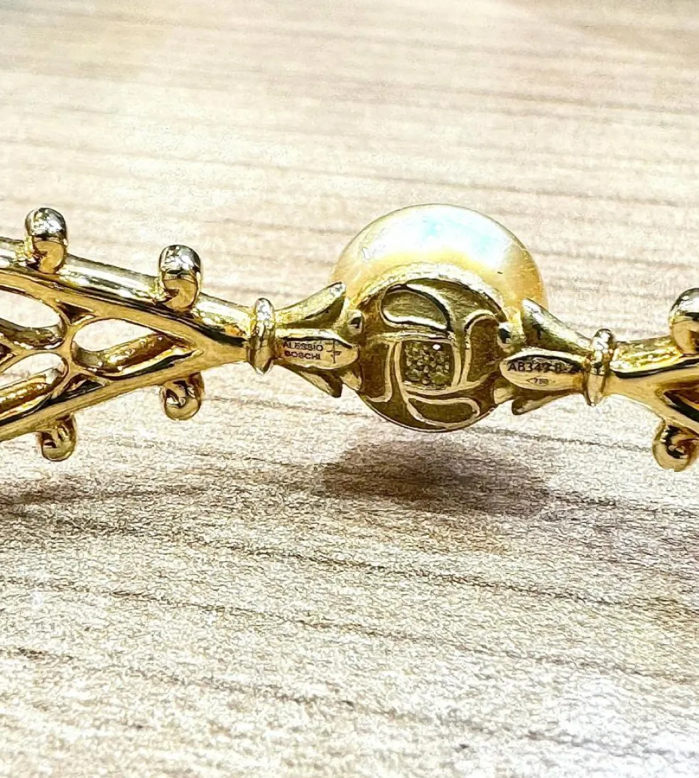 Bracelet signé Alessio Boschi , or , perles et diamants jaunes