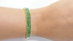 Bracelet souple en or jaune et émeraudes