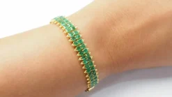 Bracelet souple en or jaune et émeraudes