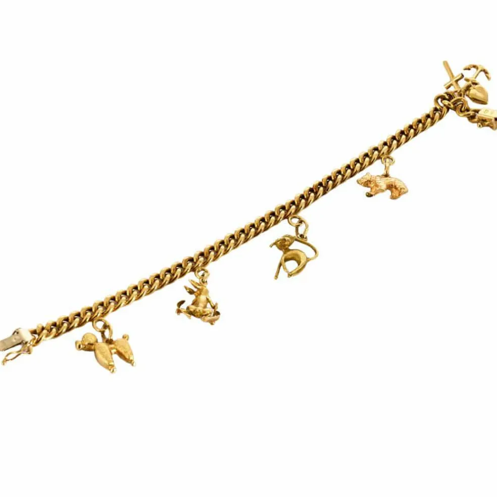 Bracelet souple or jaune et charms