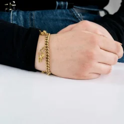 Bracelet souple or jaune et charms