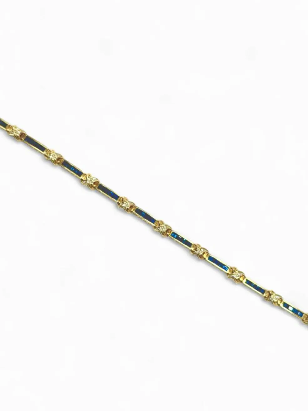 Bracelet souple or jaune, saphirs et croisillons