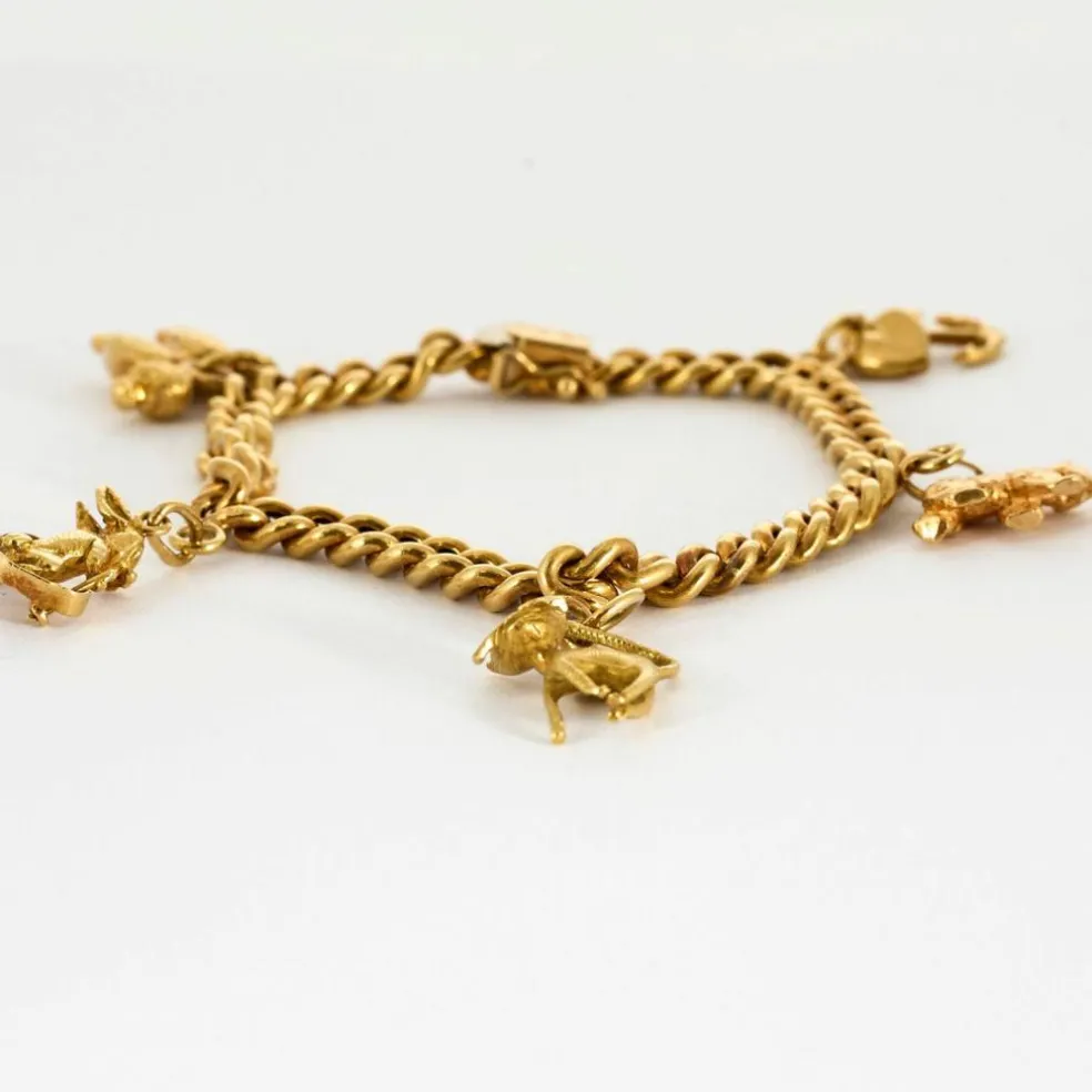 Bracelet souple or jaune et charms