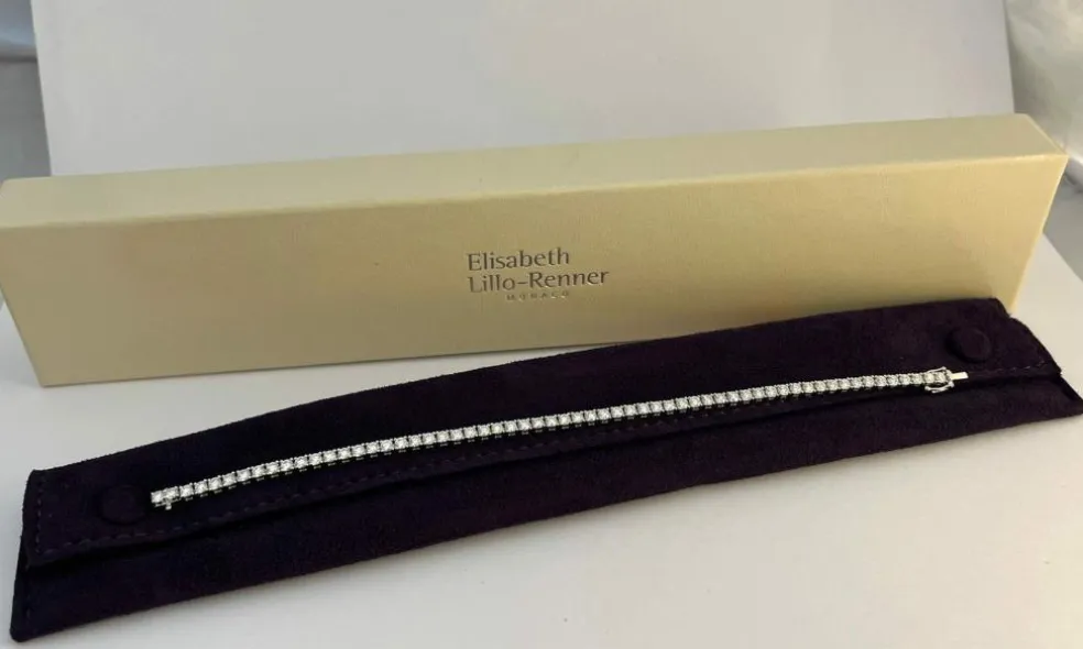 Bracelet tennis ligne en or gris serti de 60 diamants