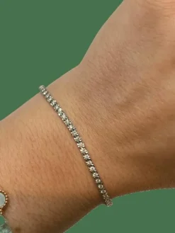Bracelet tennis rivière de 66 diamants