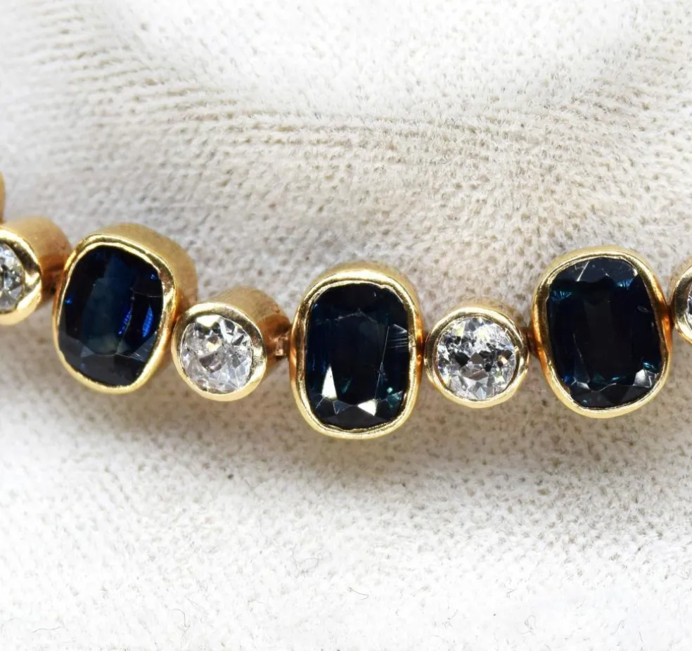 Bracelet vintage en or jaune et diamants et saphirs