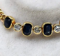 Bracelet vintage en or jaune et diamants et saphirs
