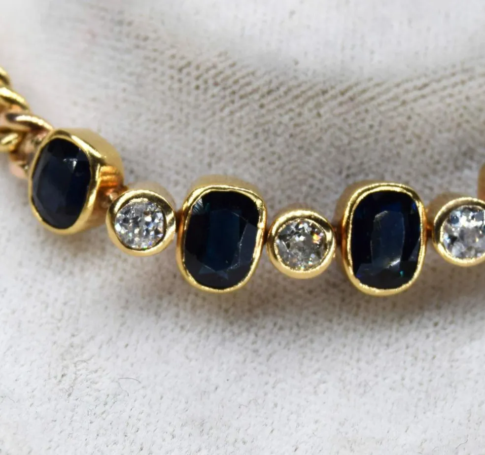 Bracelet vintage en or jaune et diamants et saphirs