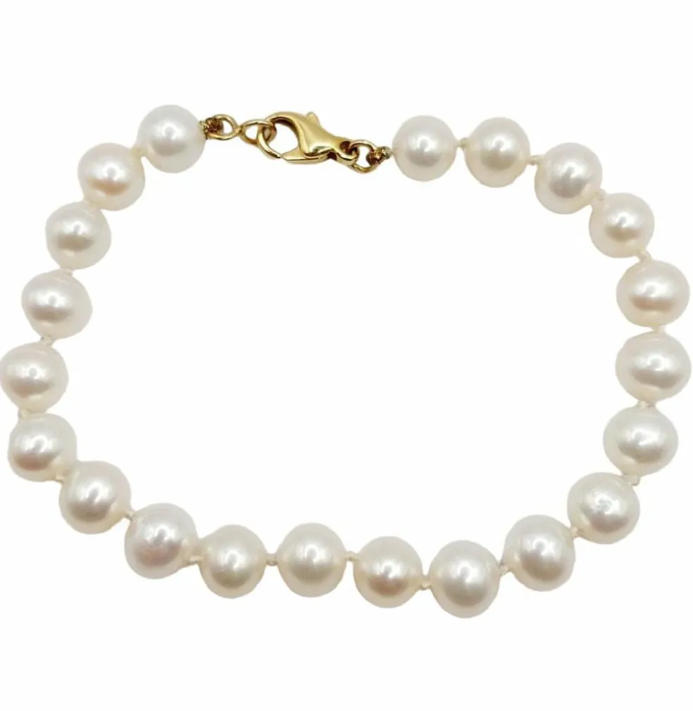 Bracelet vintage or jaune orné de perles de cultures