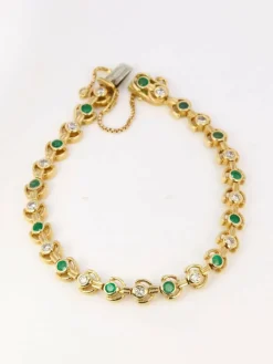 Bracelet vintage or jaune, diamants et émeraudes