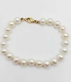 Bracelet vintage or jaune orné de perles de cultures