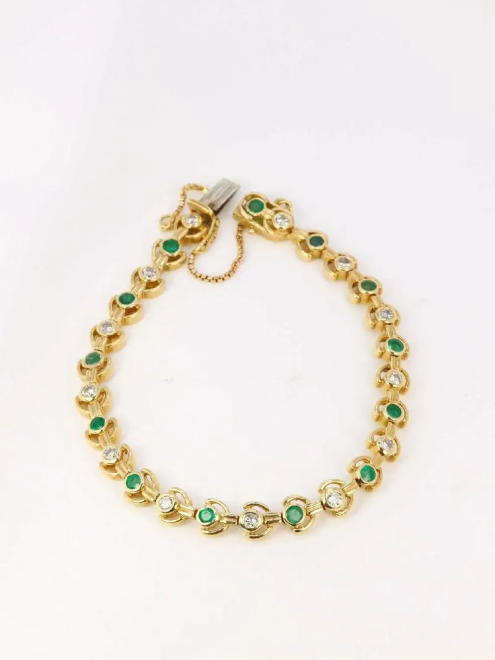 Bracelet vintage or jaune, diamants et émeraudes