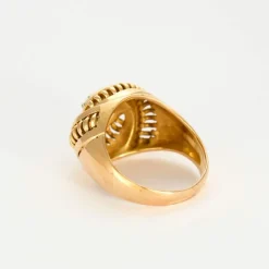 Brague rétro en or rose et diamant