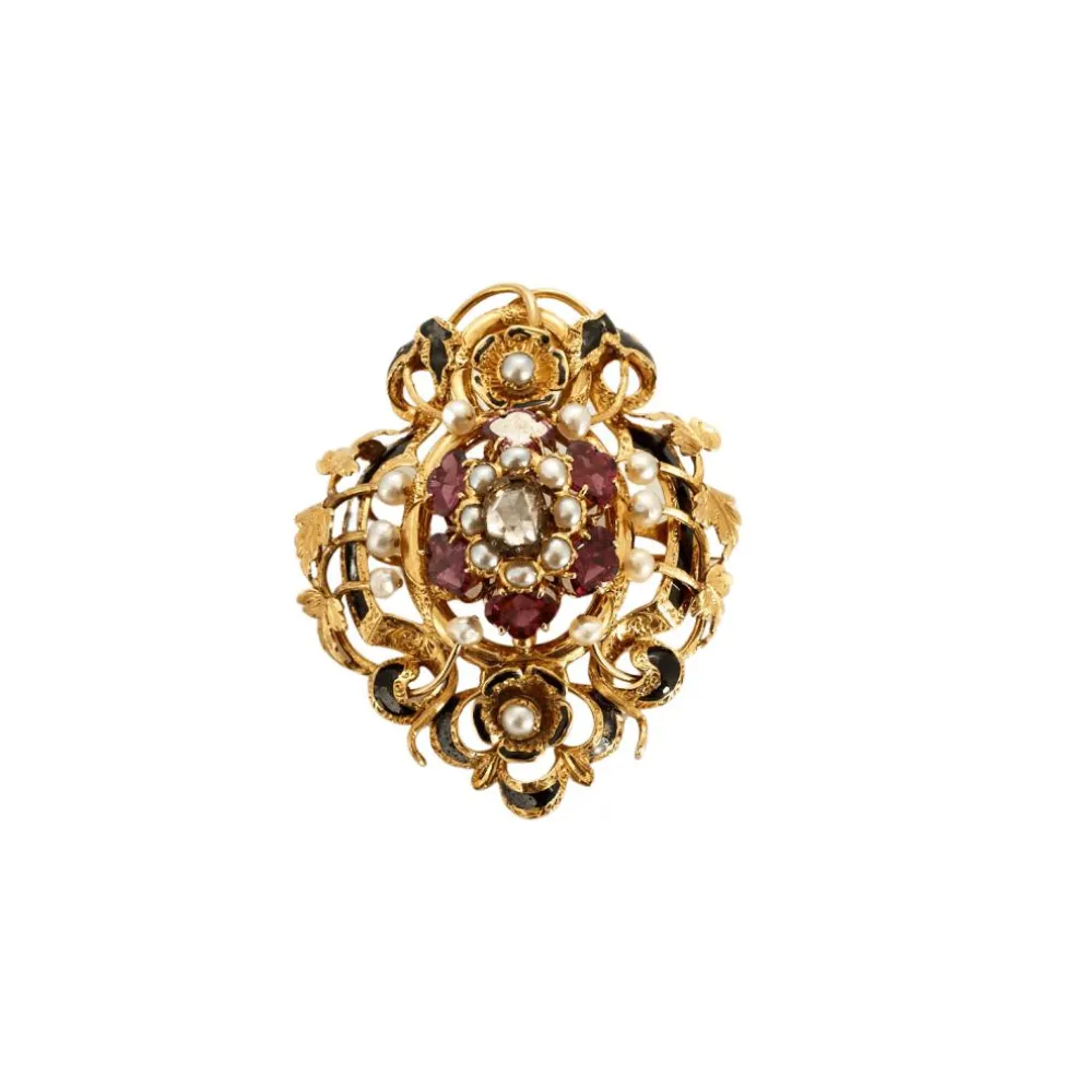 Broche à décor de rinceau et fleurs avec émail noir, perles et grenats