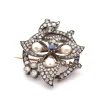 Broche 1900 or jaune et blanc perles fines, saphir et diamants