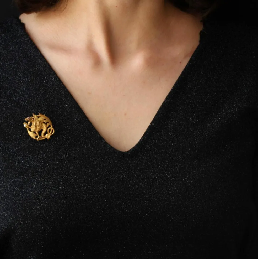 Broche ancienne chimère à la perle