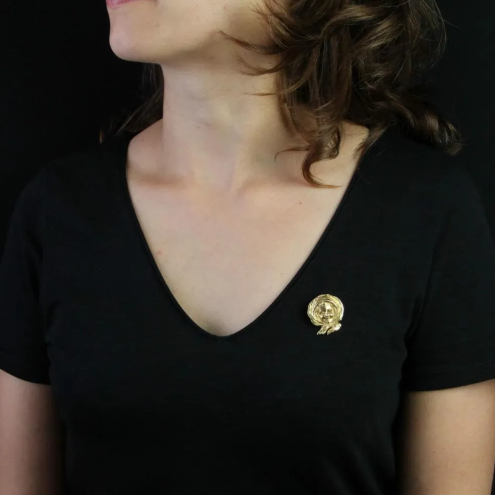 Broche ancienne en or portait d'enfant