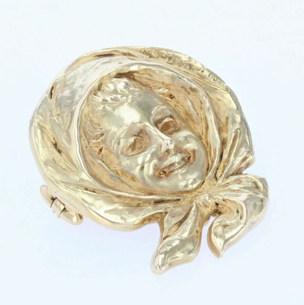 Broche ancienne en or portait d'enfant