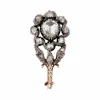 Broche ancienne fleur diamants