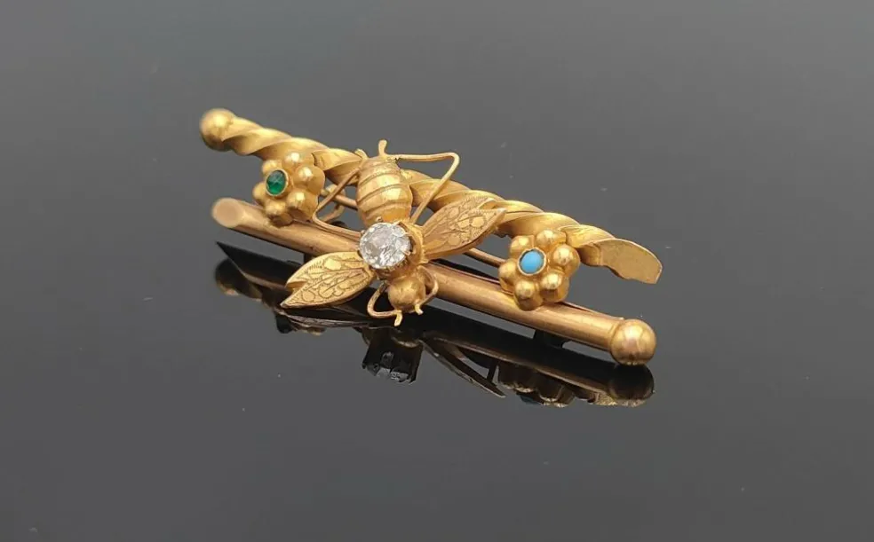 Broche animalière ancienne or jaune diamant